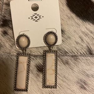 white stone studded earrings. new